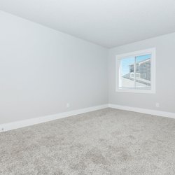 Secondary carpeted bedroom at Stone Canyon Apartments, located in Colorado Springs, CO