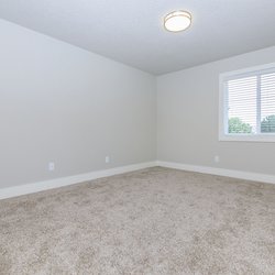 Secondary carpeted bedroom at Stone Canyon Apartments, located in Colorado Springs, CO